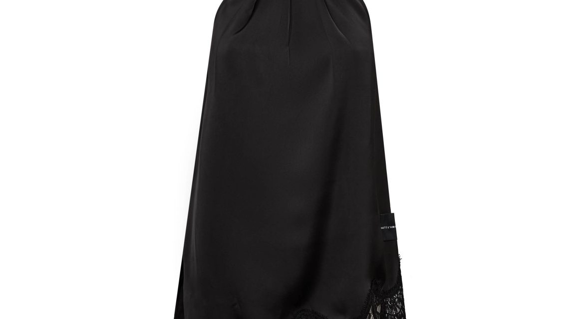 Naomi asym halter top van Haute L'Amitié met asymmetrische snit en halterhals, elegante en moderne dames top.