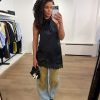 Naomi asym halter top van Haute L'Amitié met asymmetrische snit en halterhals, elegante en moderne dames top.