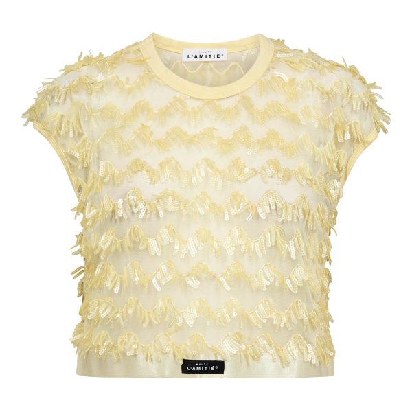 Lichtgele Limone crop top van Haute L'Amitié met cropped lengte en aansluitende pasvorm, zomerse dames top met frisse uitstraling.