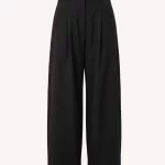 by-bar Jule Herringbone Pants in Black, zwarte high-waist damesbroek met loose fit en subtiele visgraatstructuur.