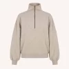 by-bar Roos Sparkle Sweater 26418902 in Gold, oversized goud-beige gemêleerde dames sweater met subtiele glitter en hoge ritskraag.