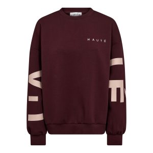Haute L'Amitié Maxi Split Logo Sweat in bordeaux met oversized fit en logo detail, trendy dames sweater met sportieve uitstraling.