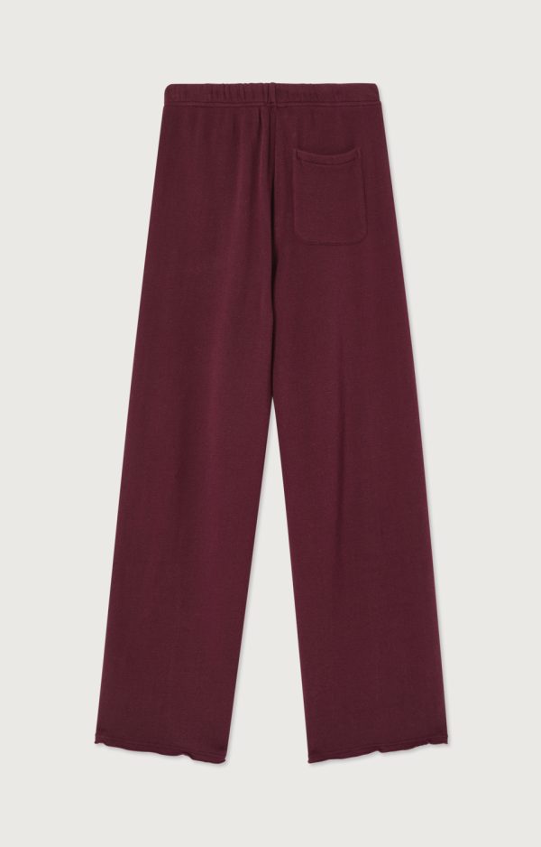 American-Vintage-Jogging-Atubay-Bordeaux-ATU05BH26LIED American Vintage Atubay wide-leg broek in Lie de Vin, bordeaux dames sweatpants met elastische taille en relaxte pasvorm.