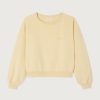 American Vintage Jitbay dames sweater in Limonade Vintage, zachtgele oversized katoenen sweater met verwassen vintage finish.