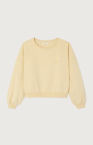 American Vintage Jitbay dames sweater in Limonade Vintage, zachtgele oversized katoenen sweater met verwassen vintage finish.