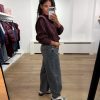 HOMAGE Knitted Sweater With Shoulder Detail in bordeaux, wijnrode gebreide damestrui met opvallende schouderdetails.