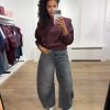 HOMAGE Knitted Sweater With Shoulder Detail in bordeaux, wijnrode gebreide damestrui met opvallende schouderdetails.