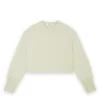HOMAGE Top With Cuff Details in Pistachio, pistachegroene dames top met verfijnde manchetdetails en vrouwelijke uitstraling.
