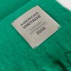 American Vintage Zinaco sjaal ZI20AH26MINTL in Mint Logo, zachte mintgroene gebreide sjaal met lange franjes aan de uiteinden.